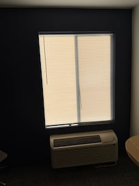 No curtains. Made it hard to sleep either bright lights outside of window.