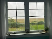 The view outside one of the side bedrooms