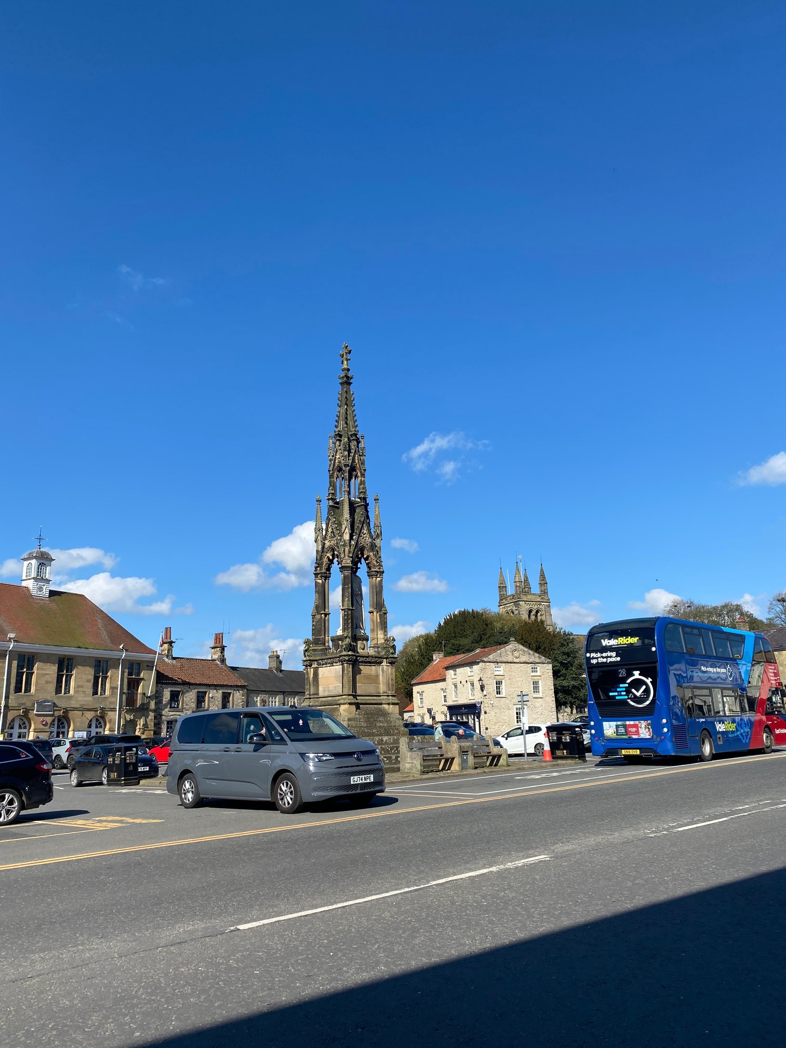 The square with monument and church