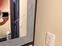 Broken cracked mirror.