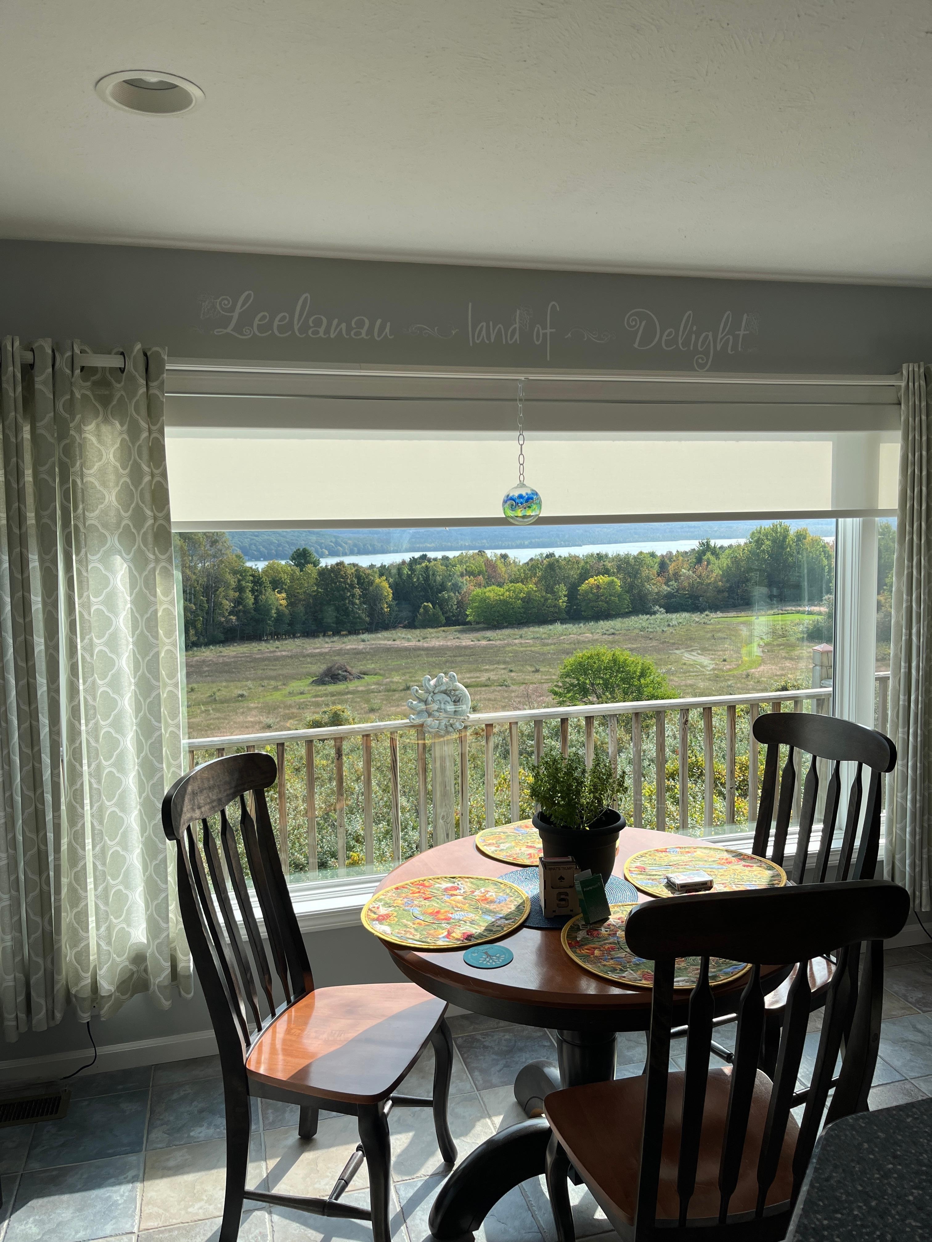 Example  high curtain like your cabinets would look best. If you decide to do it.