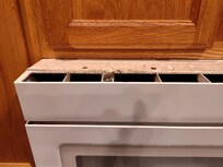 Webs and grease above microwave