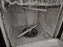 Inside of the dishwasher.