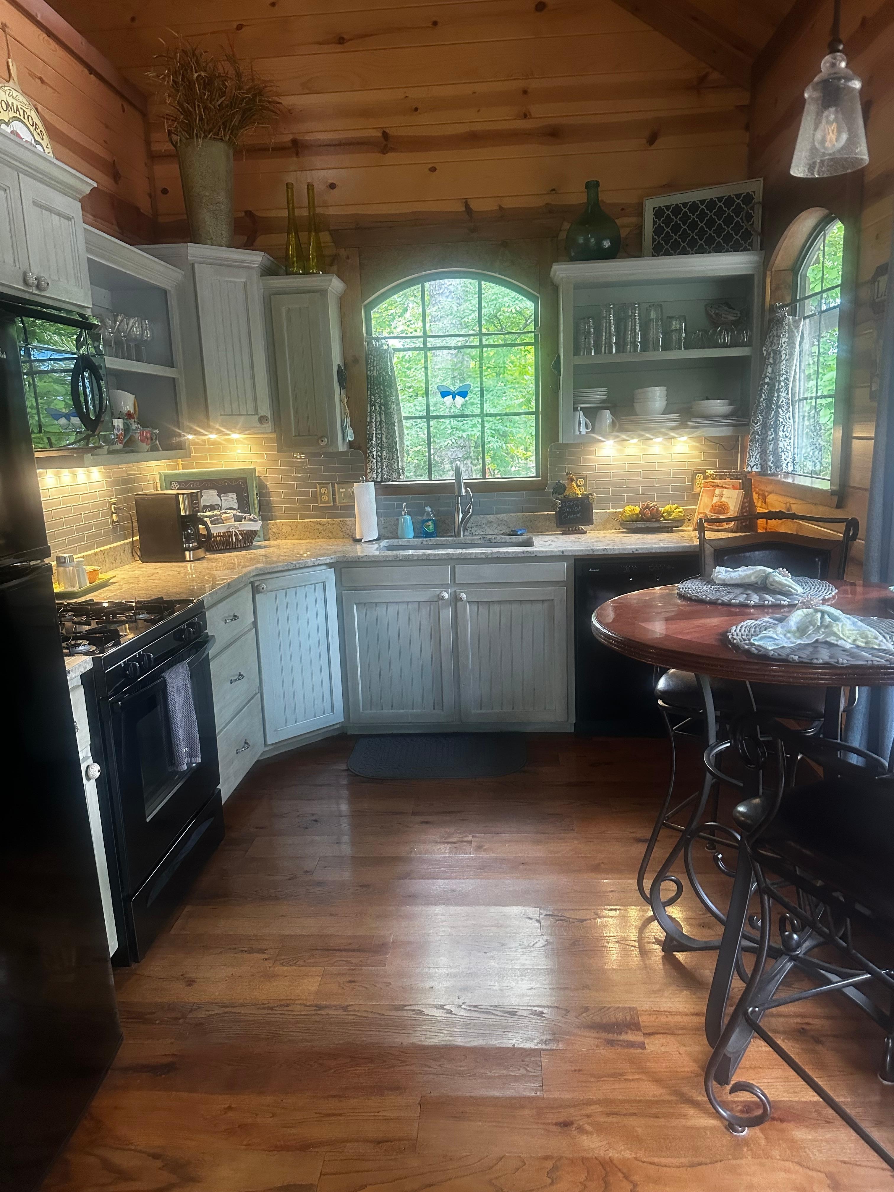 Kitchen is well stocked and love the decor here. 