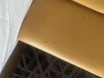 Rooms smell like smoke, cigarette burn holes in furniture