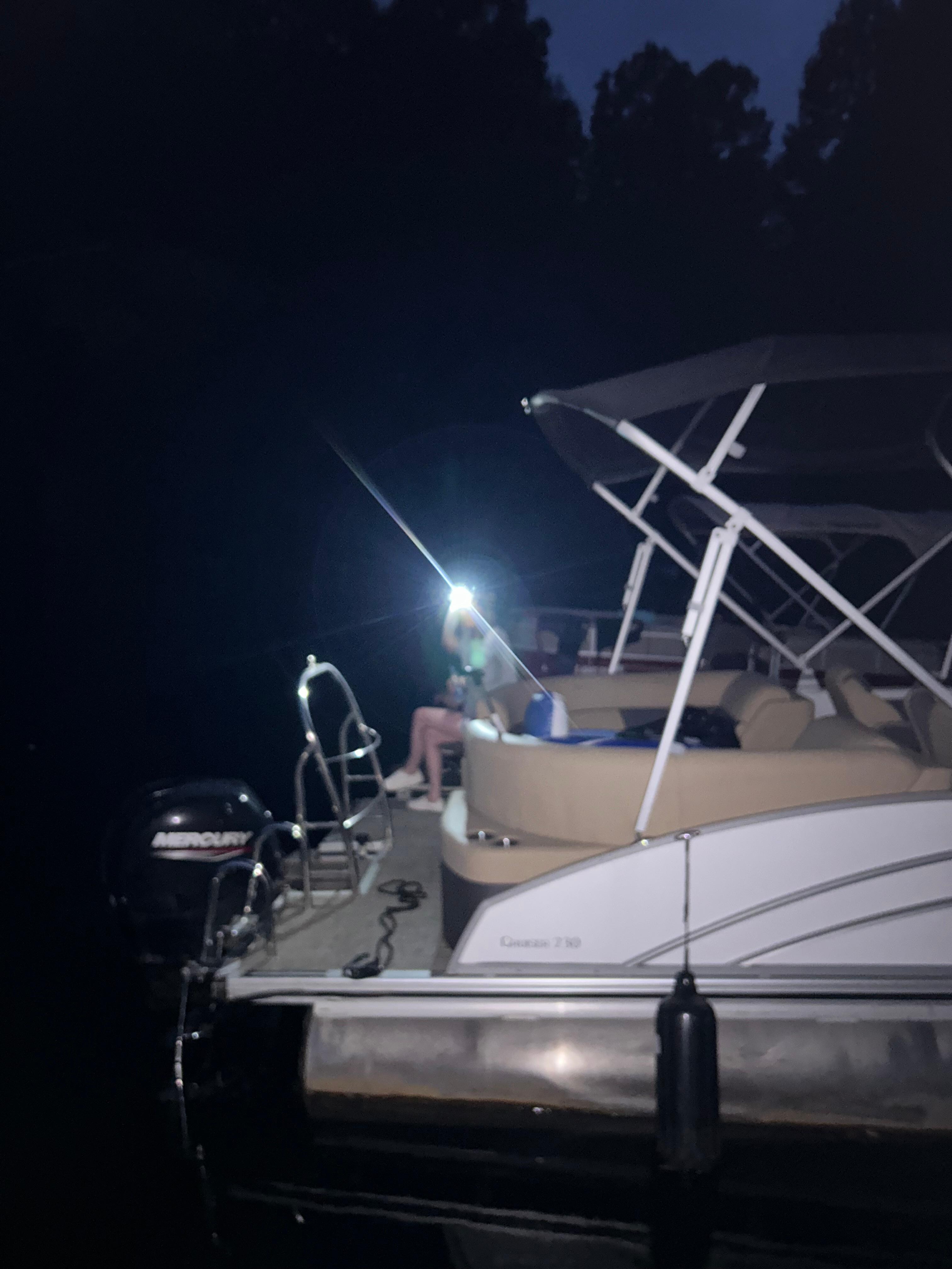 Night fishing at boat dock off 2 pontoons 