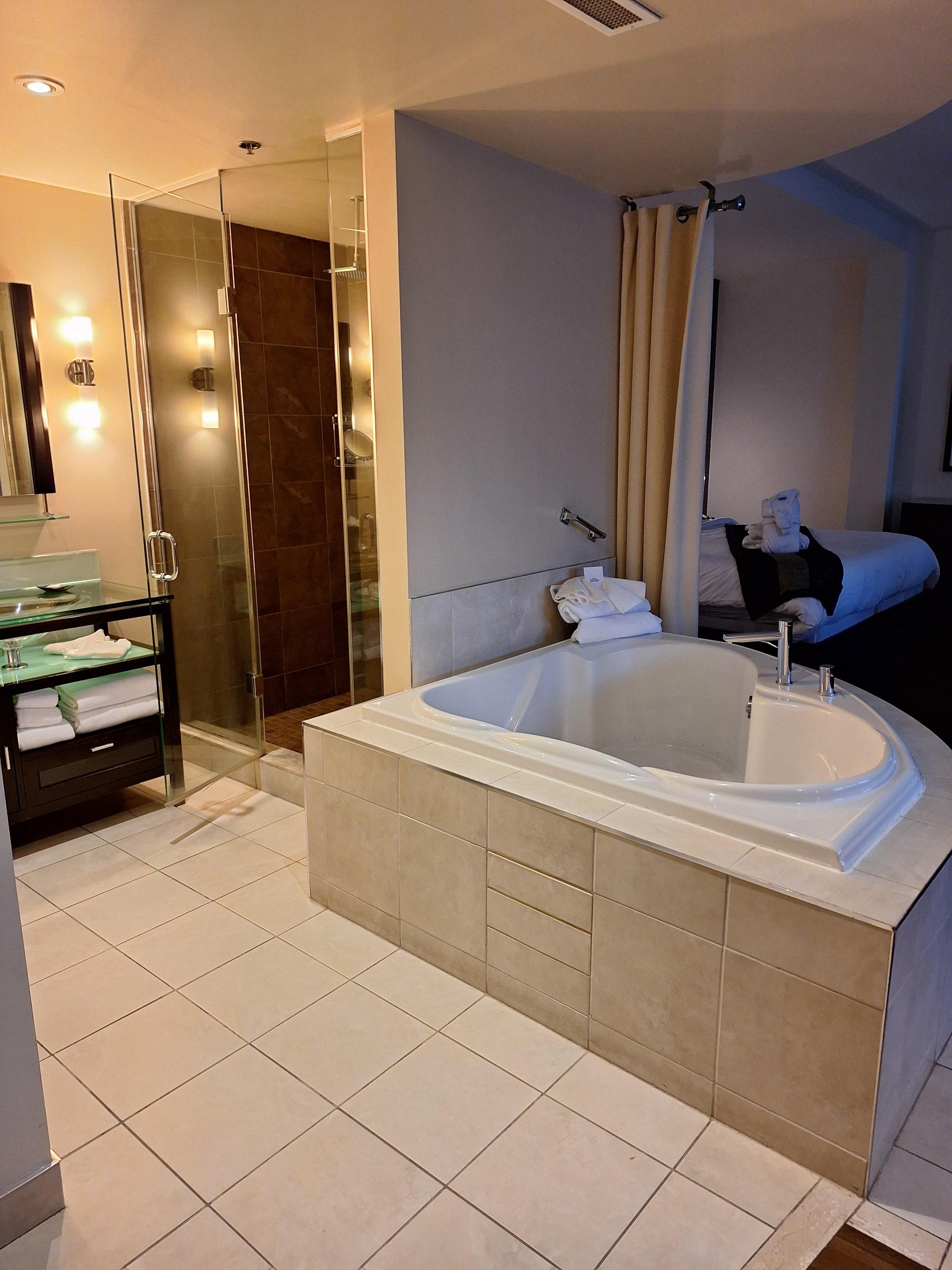 Jetted tub and a full shower