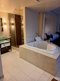 Jetted tub and a full shower