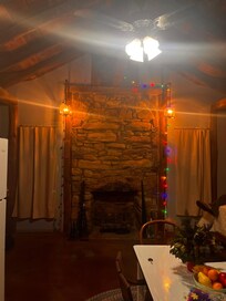 Christmas lights by the fireplace