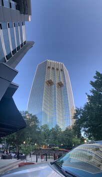 View from the front courtyard. Building looks holographic.