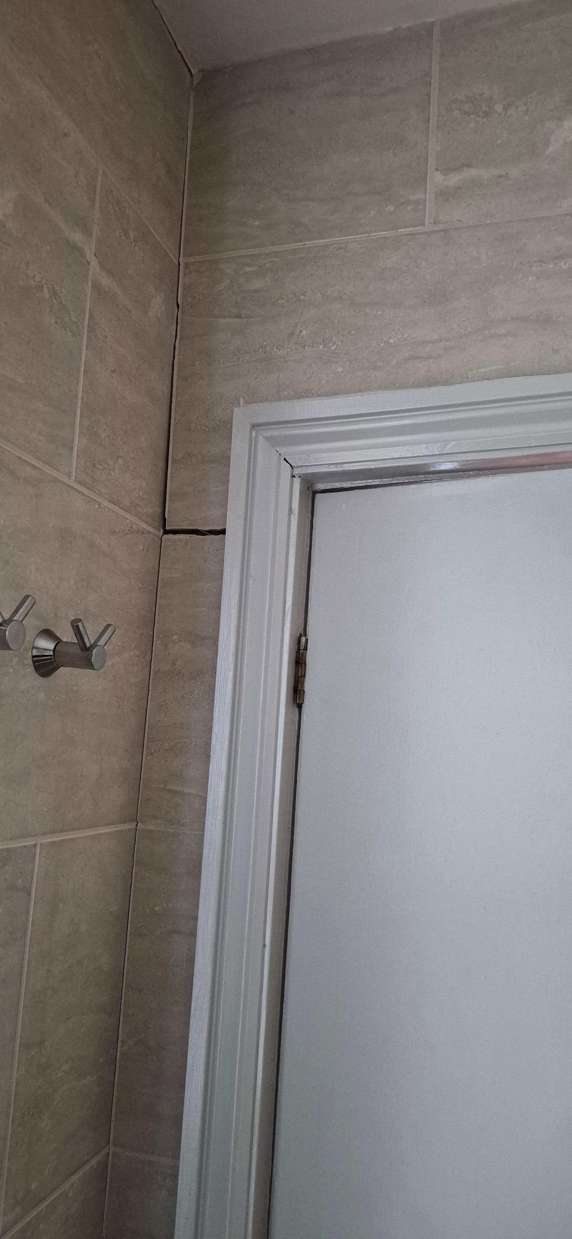 Door & frame are not the same shape so the bathroom door doesn't shut