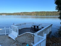 A private table by the pool to watch the lake activity