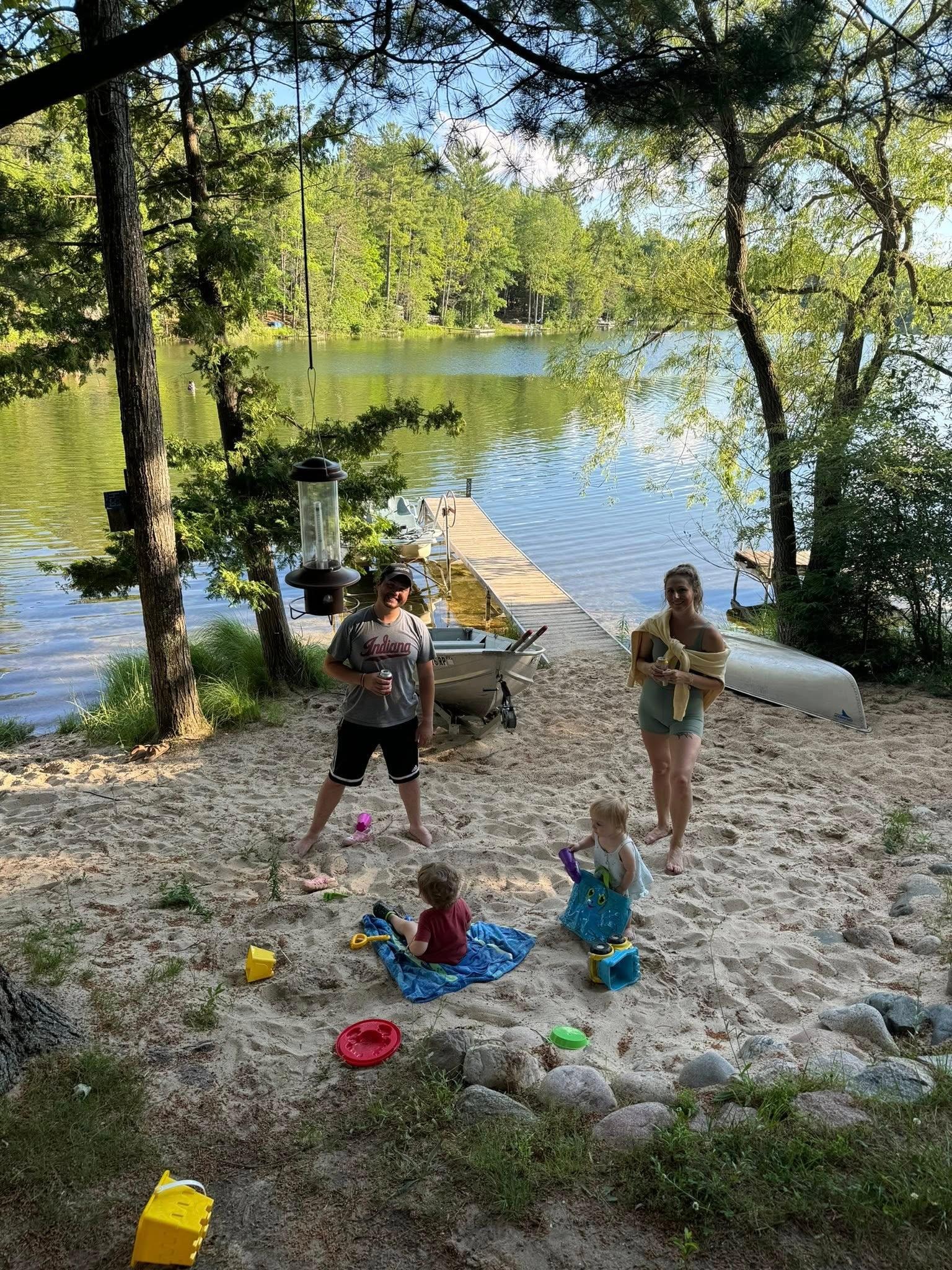 Kids enjoying the sand on Perch Lake.