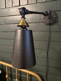 Broken reading light. Unable to angle for reading.