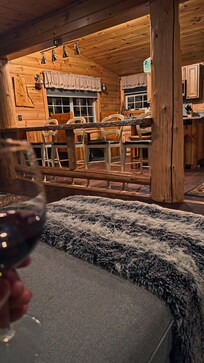 Sipping wine in the cozy living room after a soak in the hot tub was the perfect way to end our winter nights. 🤍