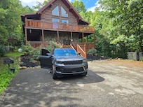 Driveway and front of the cabin.