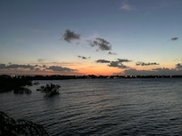 How my room actually looked. The headboard is extremely old and chipped and in poor condition but painted over. The light integrated into it is unusable, it is way too cold and bright, like a light used on an operating room.