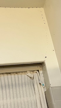 Without the towel covered, you will be seen from 2 floor balcony.