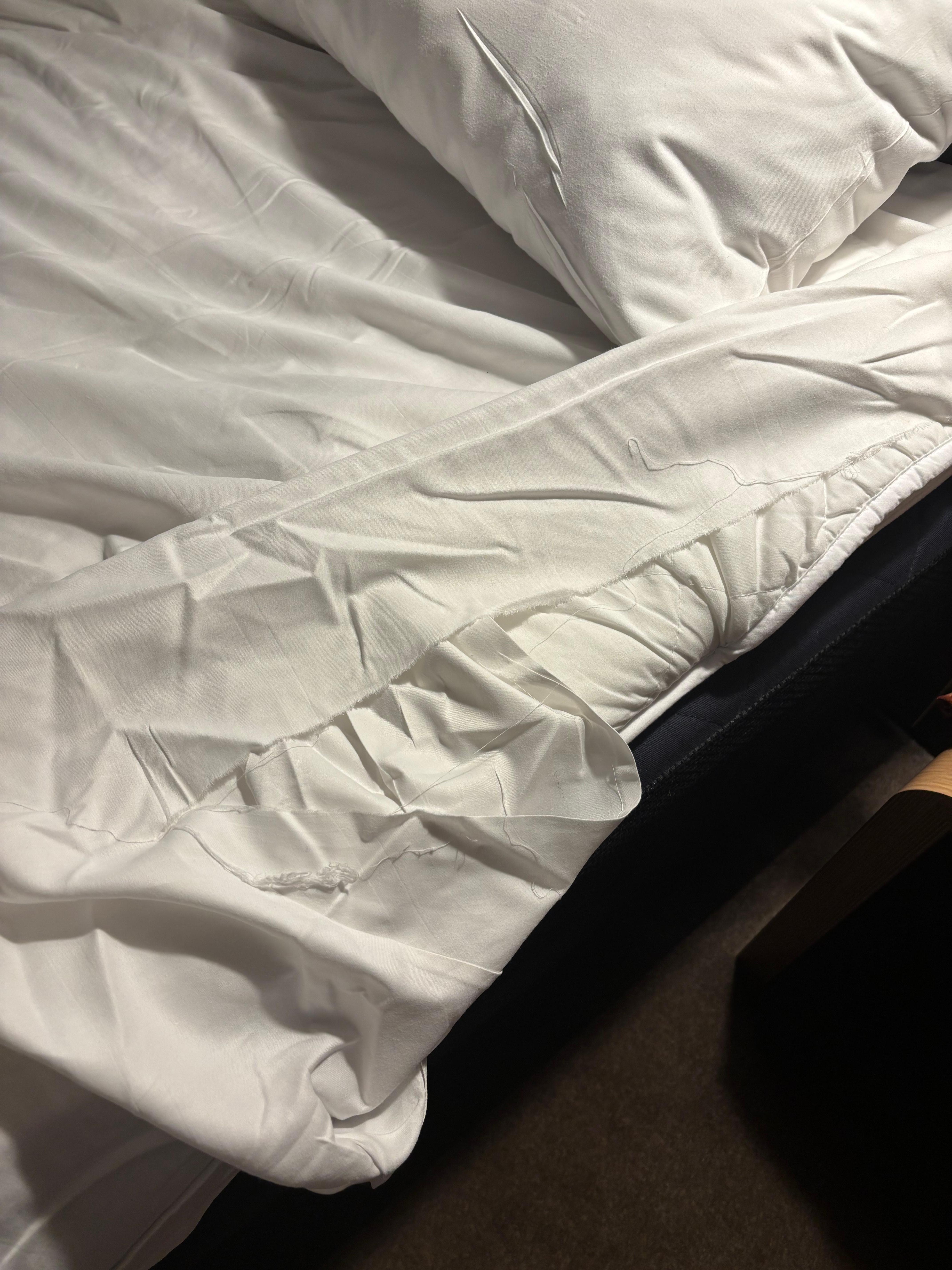Torn bedsheets on the bed