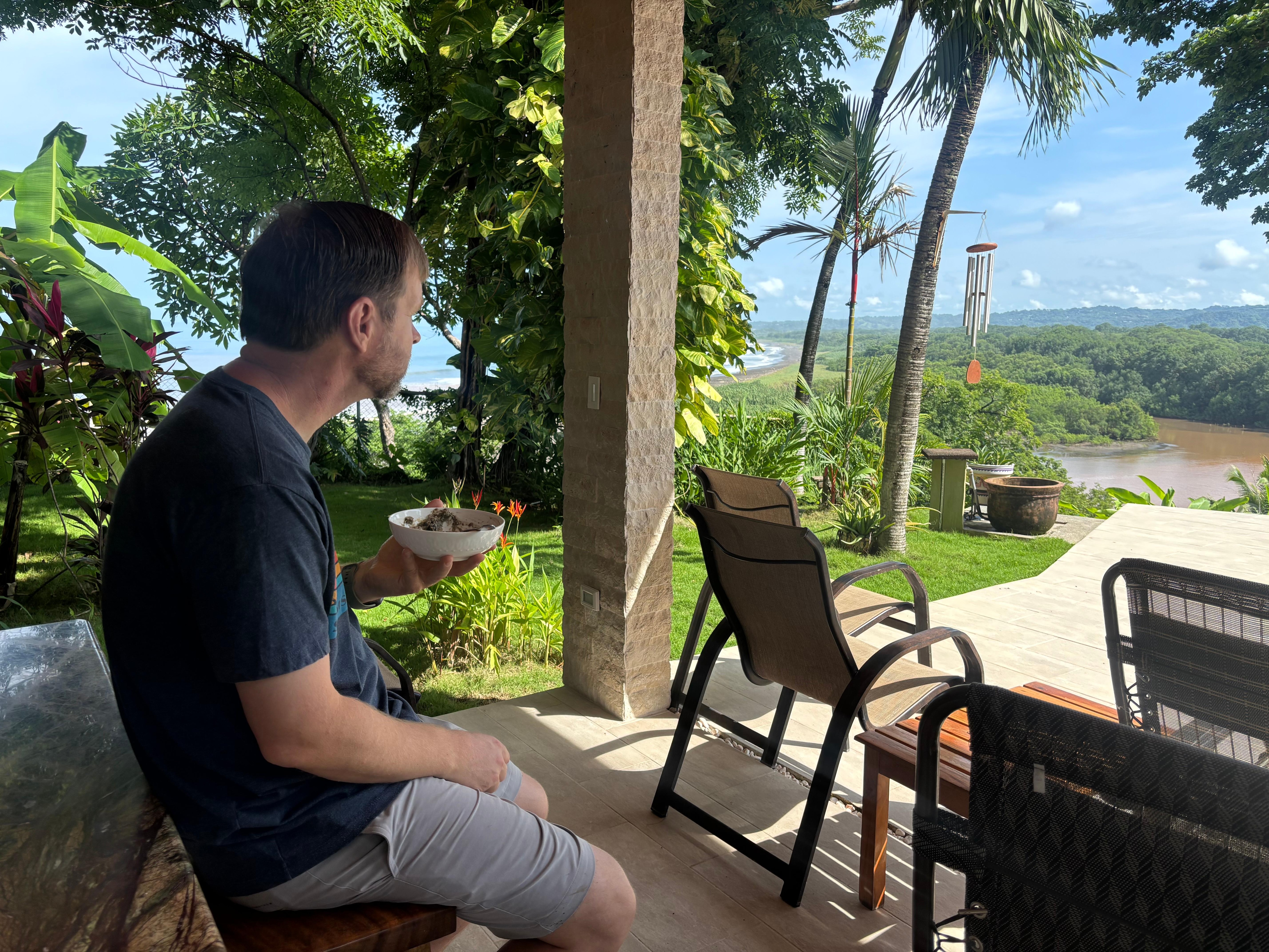 Kory enjoying lunch from the pavilion next to the pool