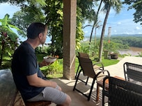 Kory enjoying lunch from the pavilion next to the pool