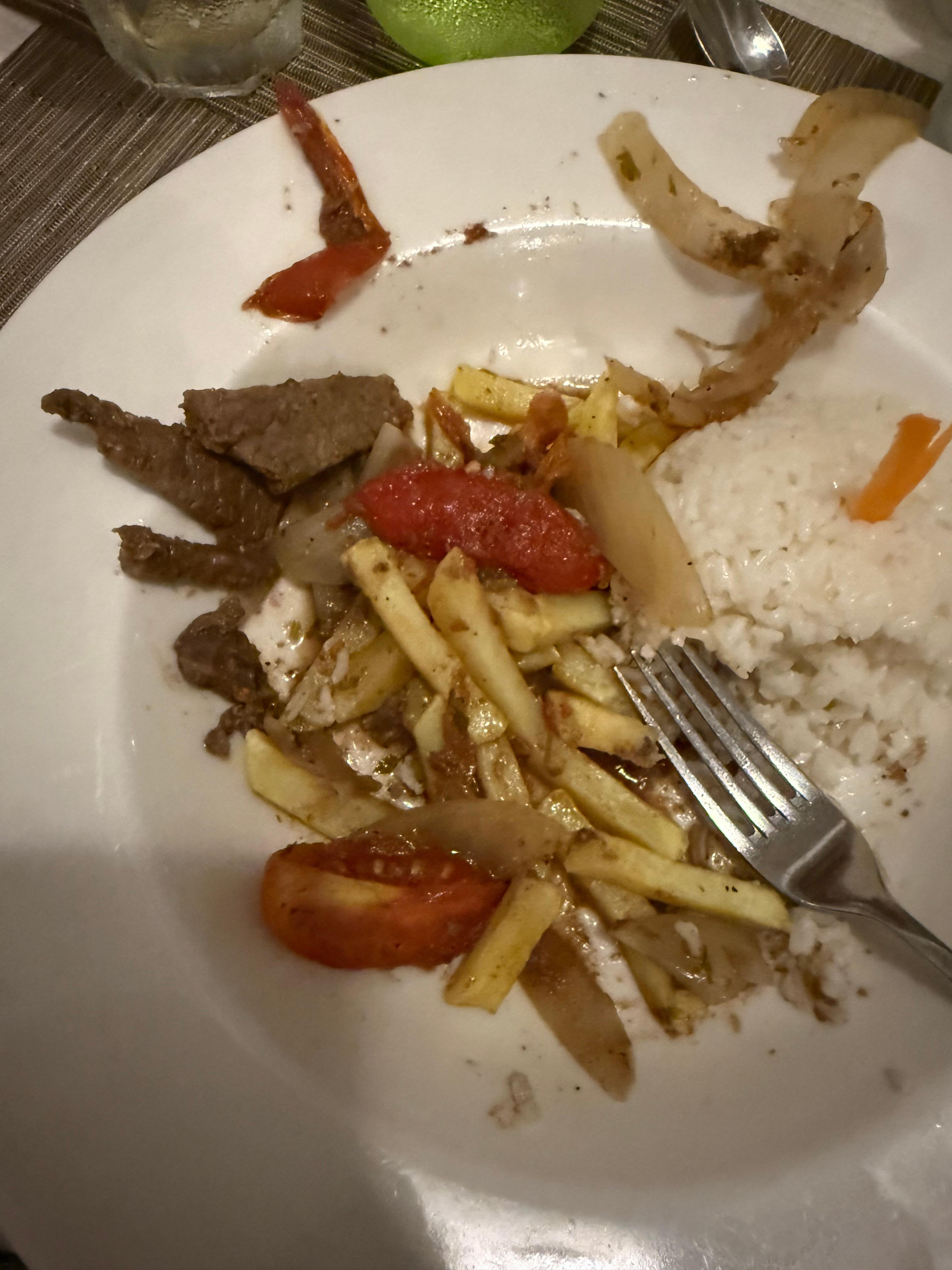 Plate with only a tiny amount of meat, lots of fries and rice, they are not providing almost no protein