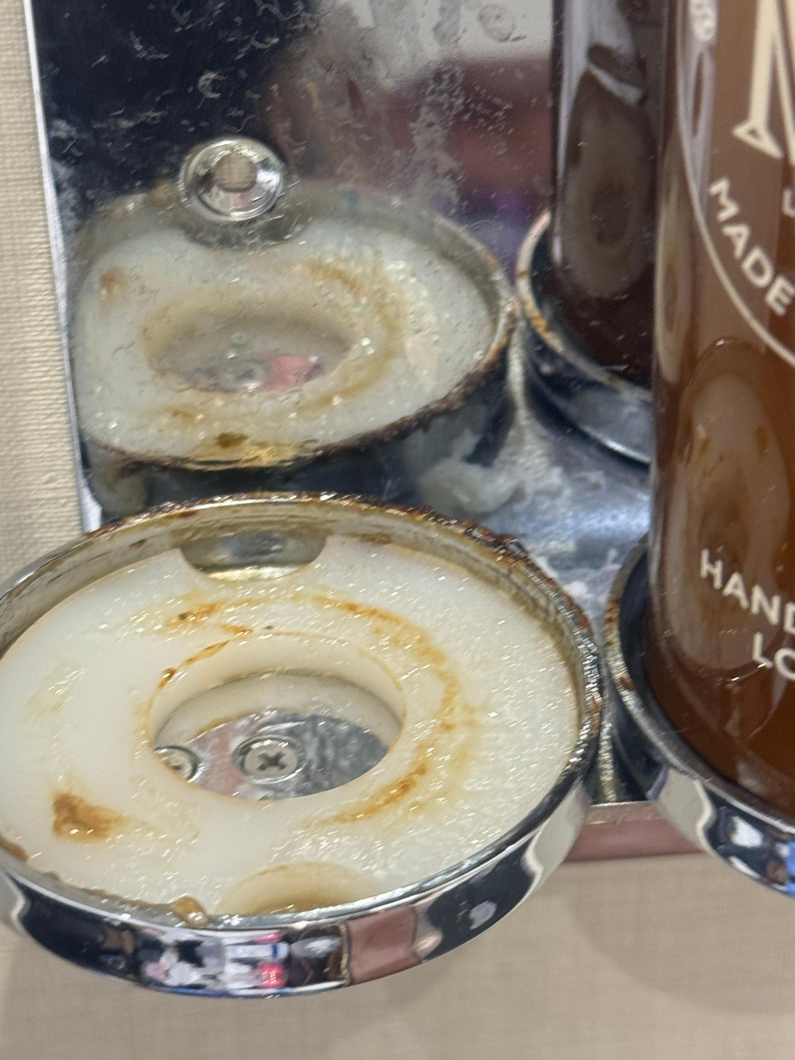 Mold on soap dispenser