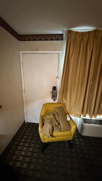 Conditions of the door. We placed a chair for added security.