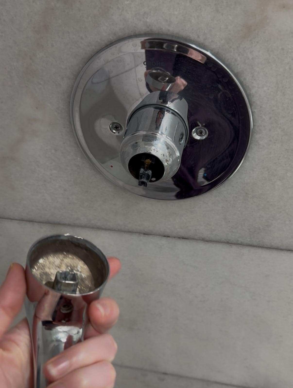 Shower handle falls off