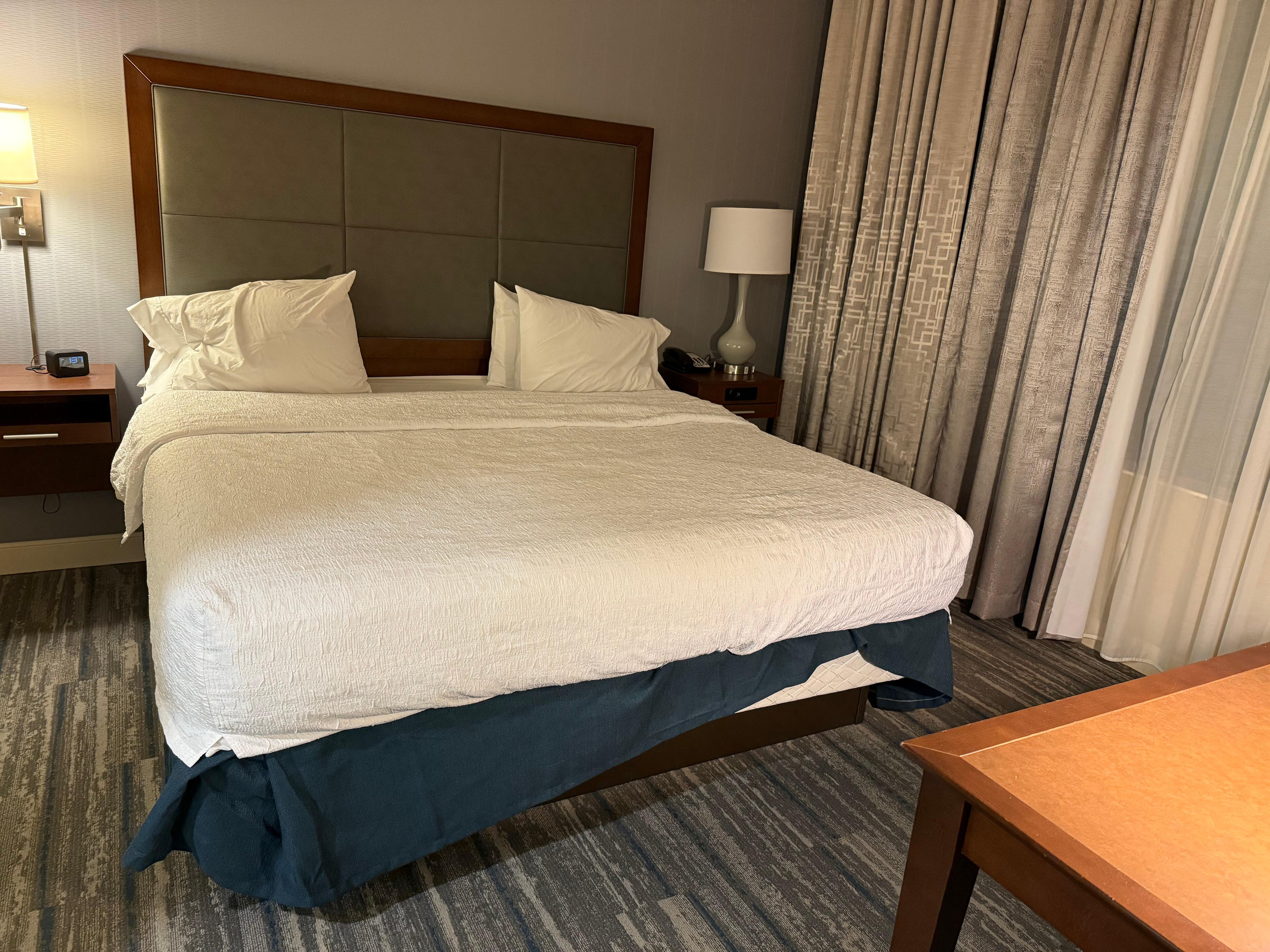 Staff could fix the valance so the bed looks nice.