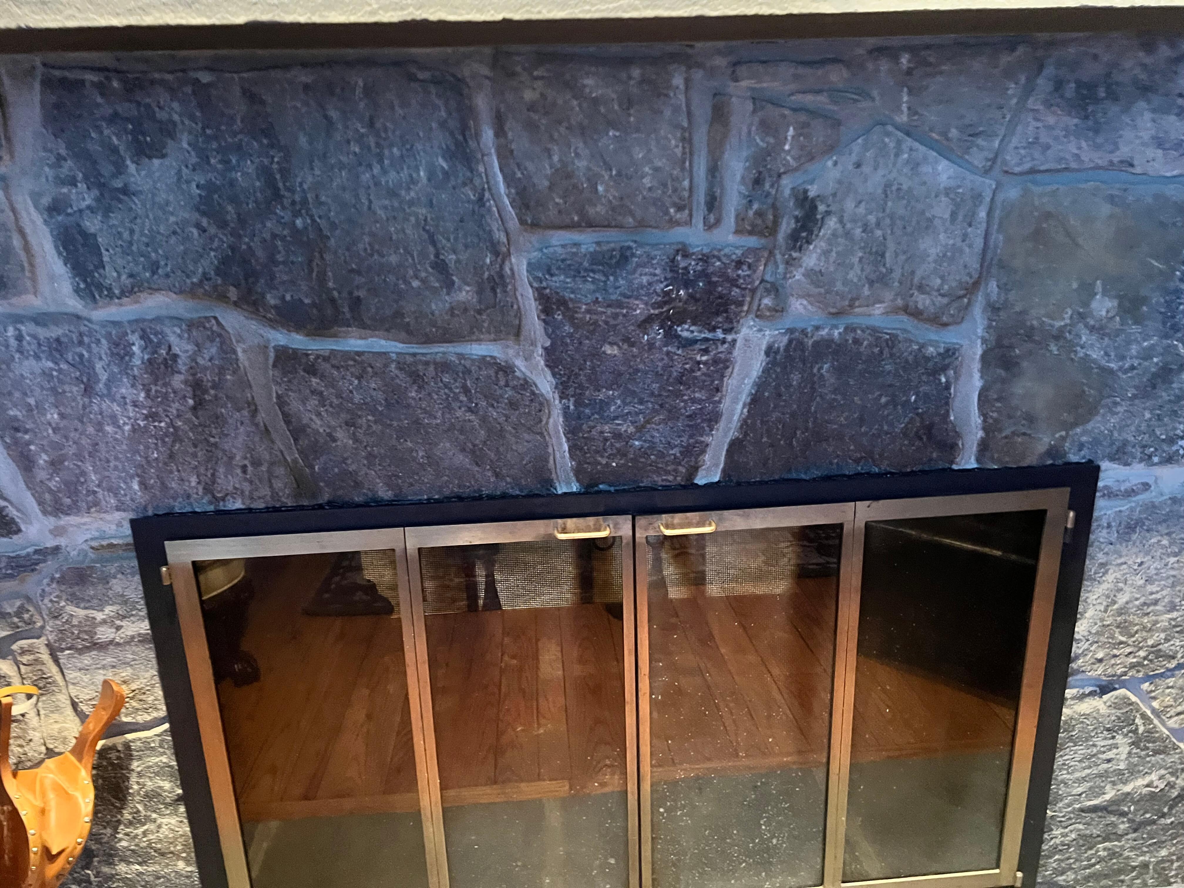 Fireplace with black smoke on the wall. Looks like 
