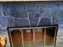 Fireplace with black smoke on the wall. Looks like