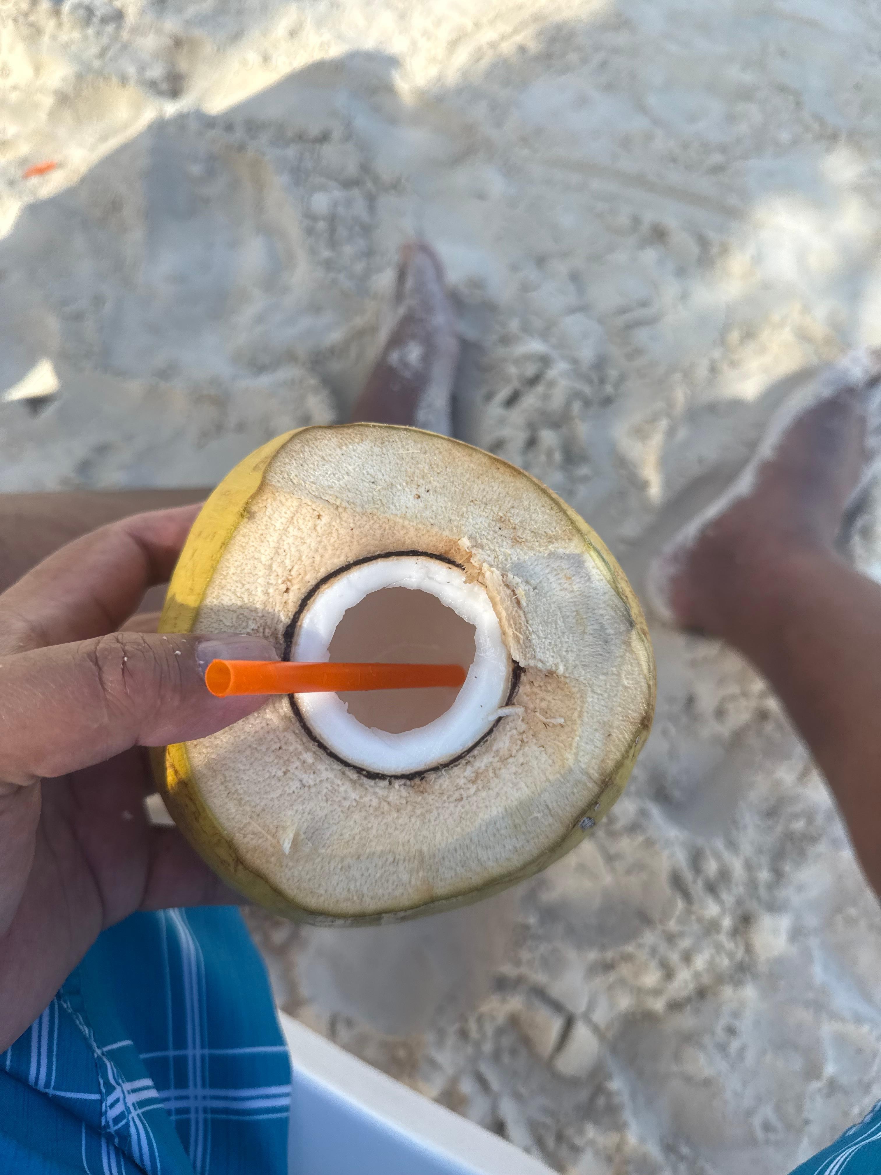 Enjoying a coconut on the beautiful