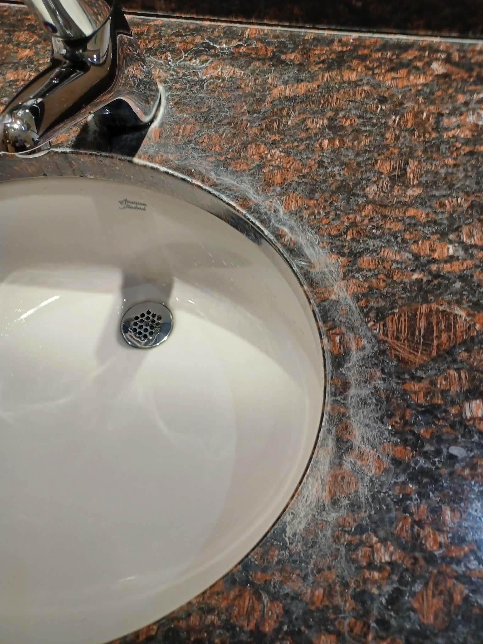 The public restrooms by the restaurant are tired and old.