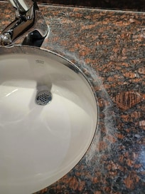 The public restrooms by the restaurant are tired and old.