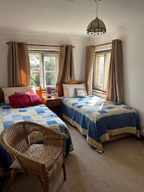 Twin bedroom with basin