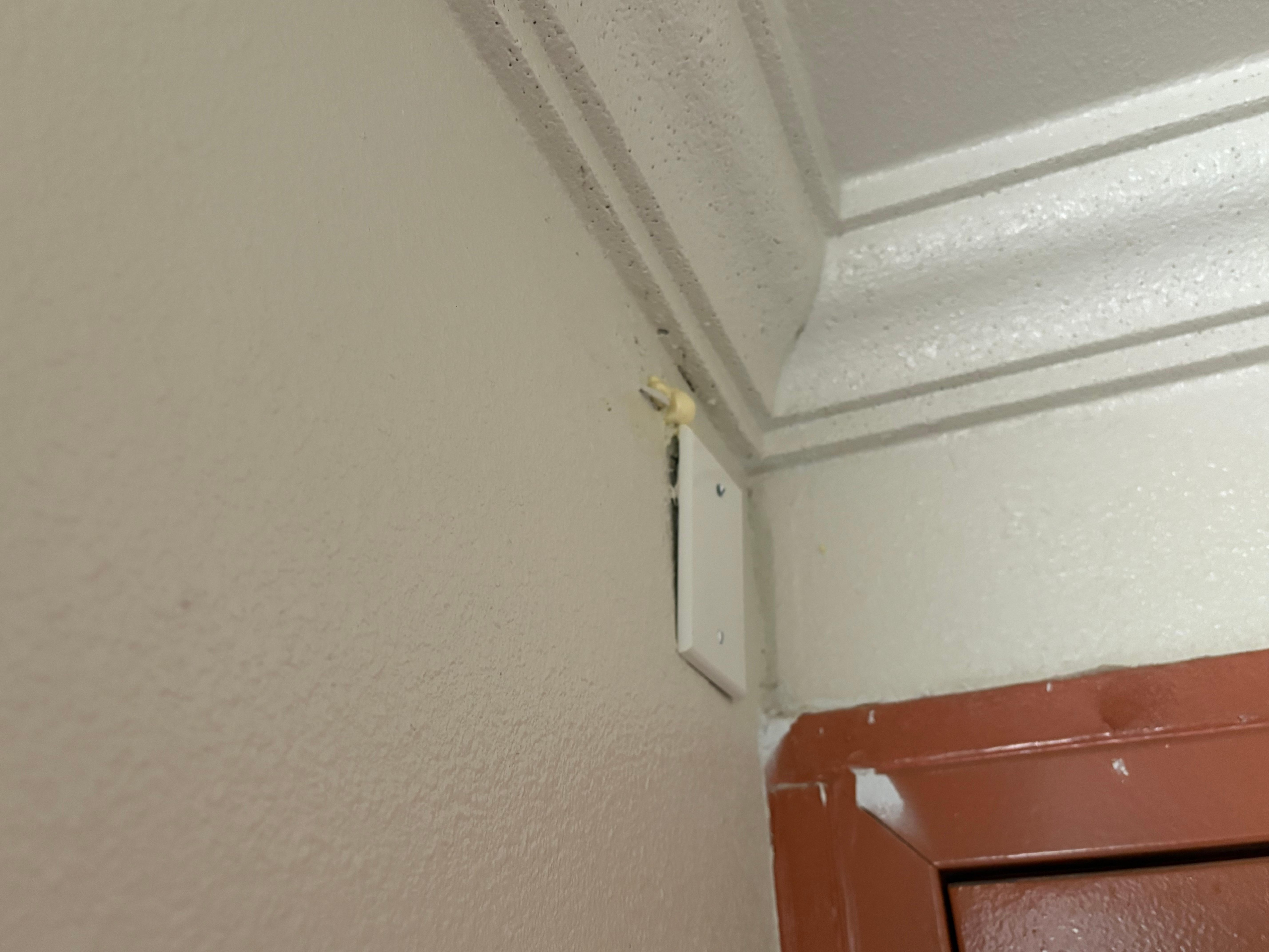Electrical cover not secured properly.