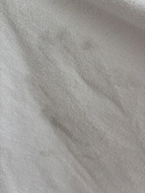 Faded bloodstains on towels