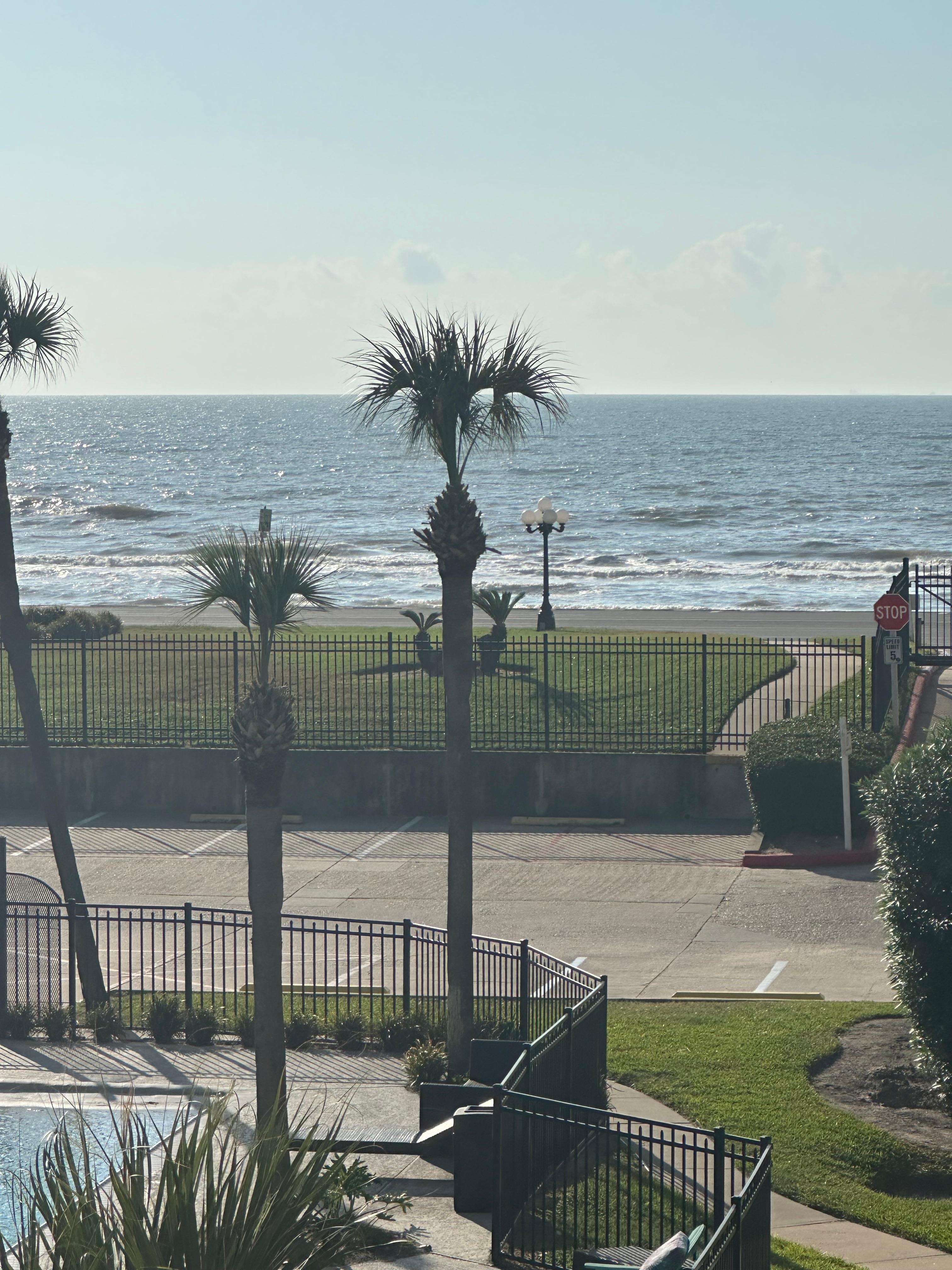 View from our rental out over the pool and out to the beach. 