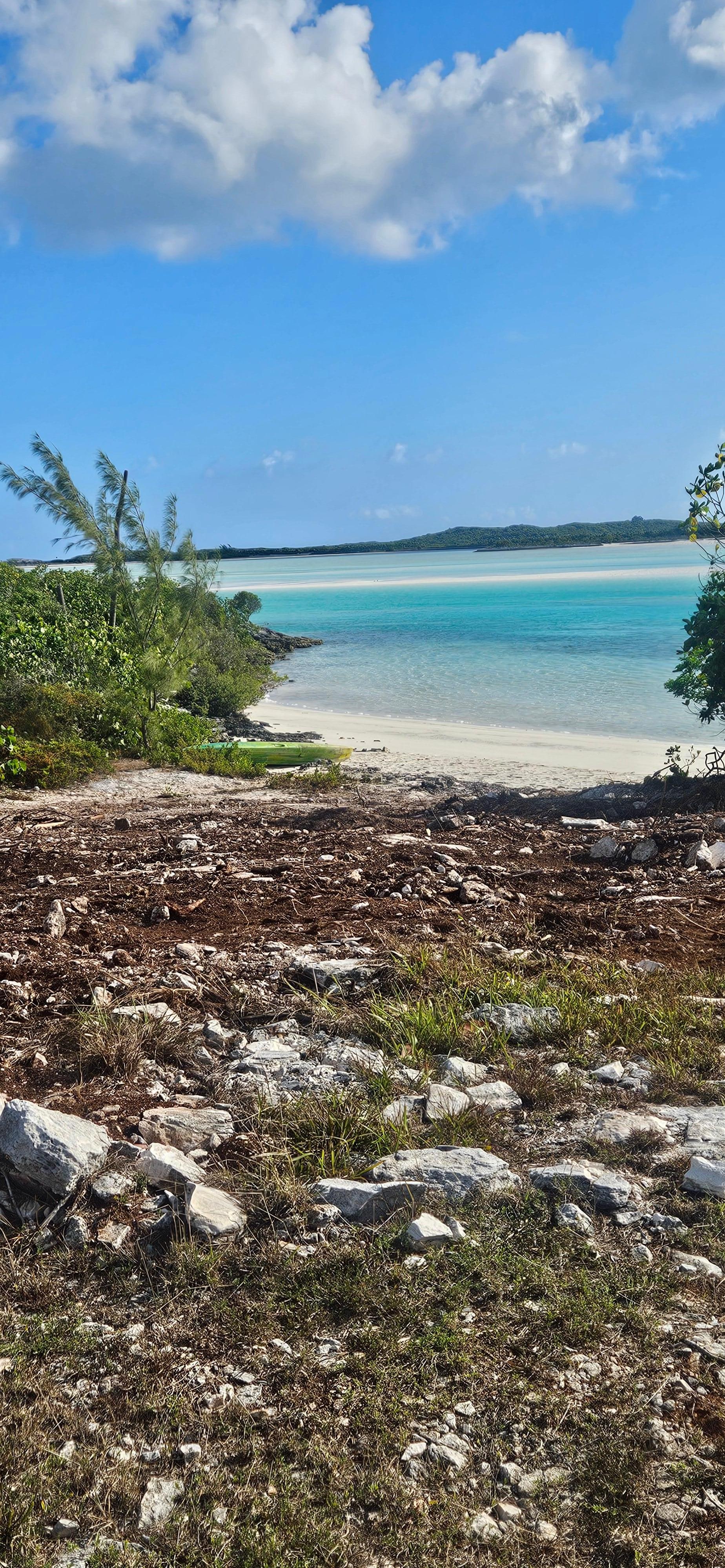 Beach in front of house