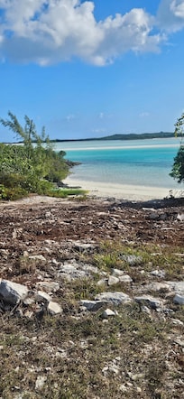 Beach in front of house