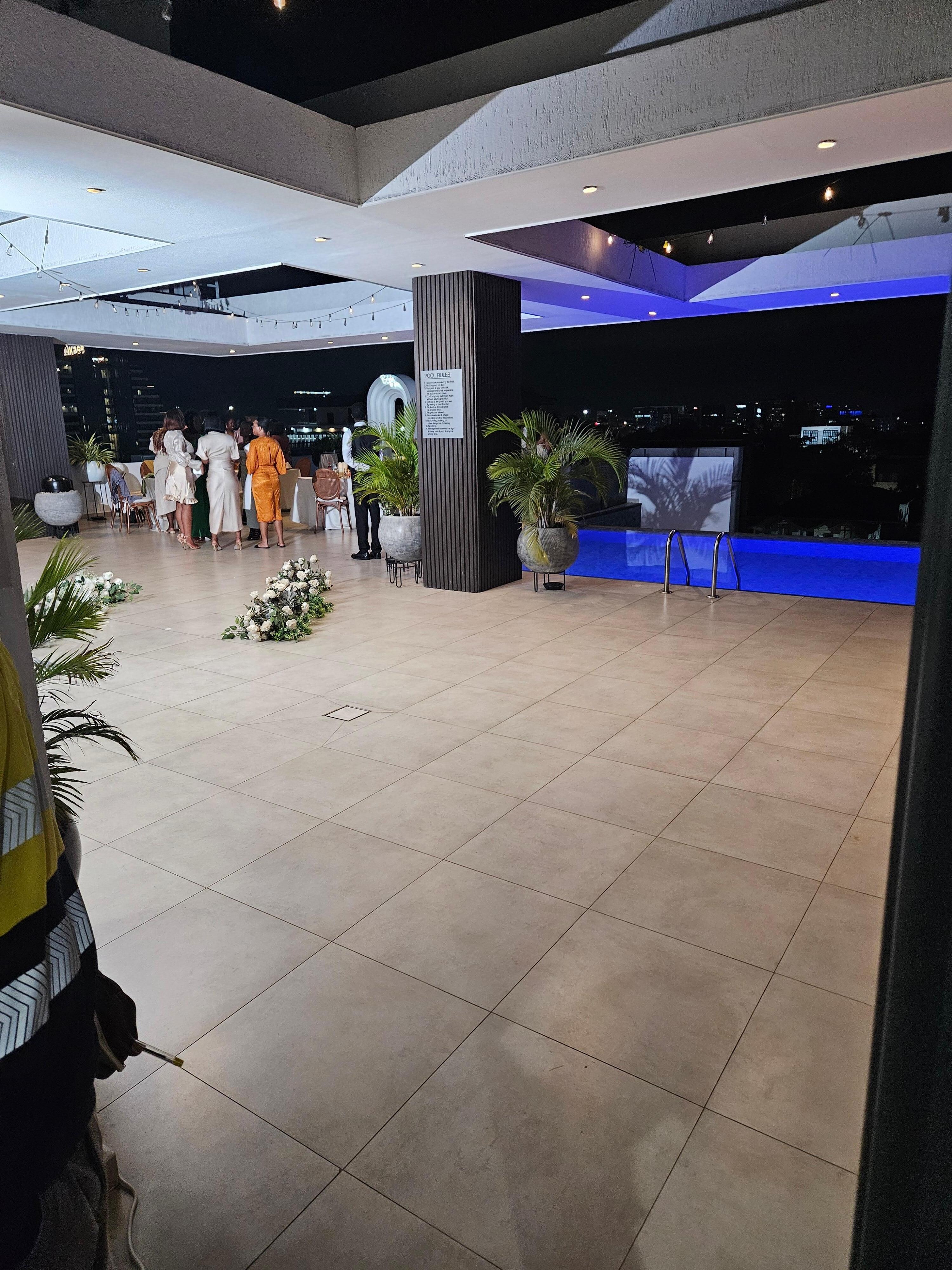 Roof top rented to a private event to people that don't even stay at the essence.