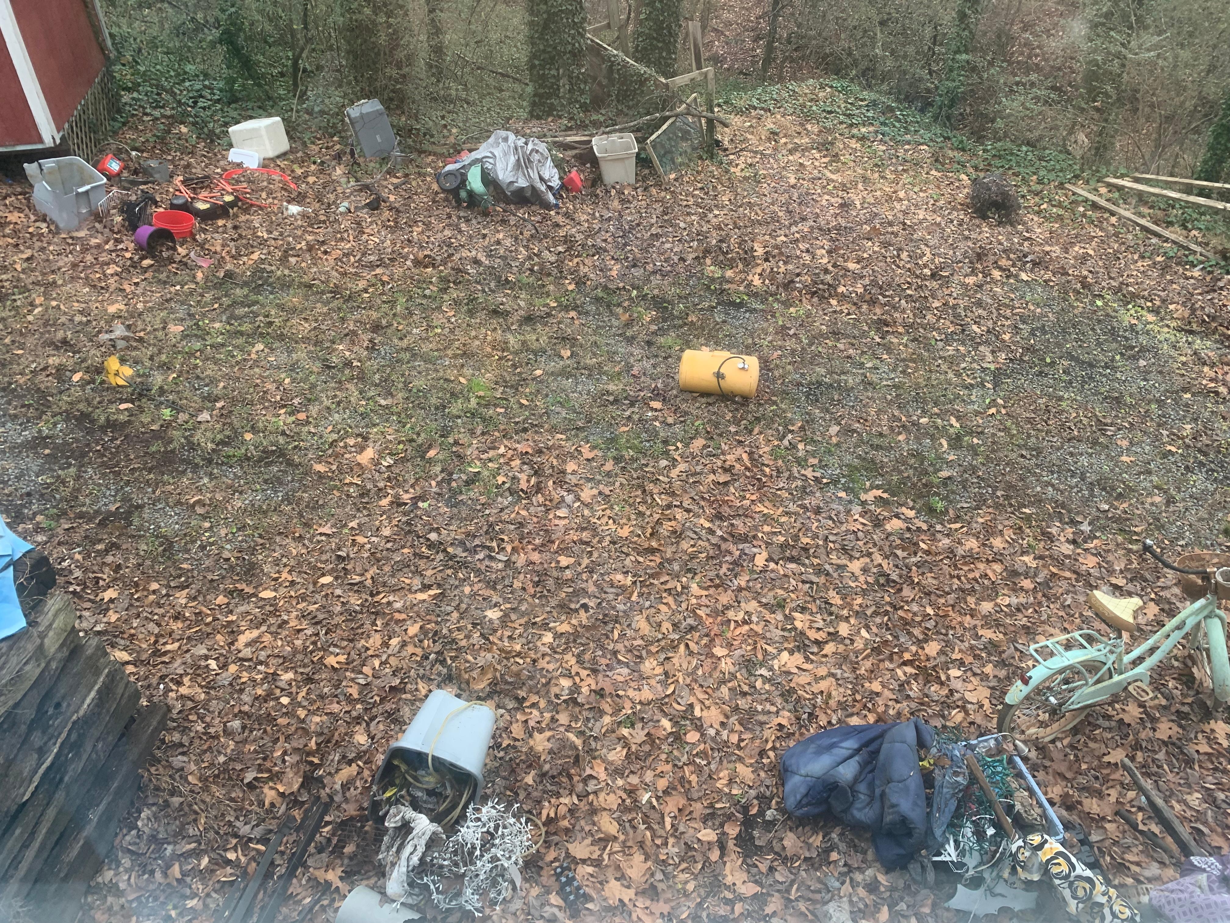 Side yard trash all over. 