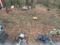 Side yard trash all over.