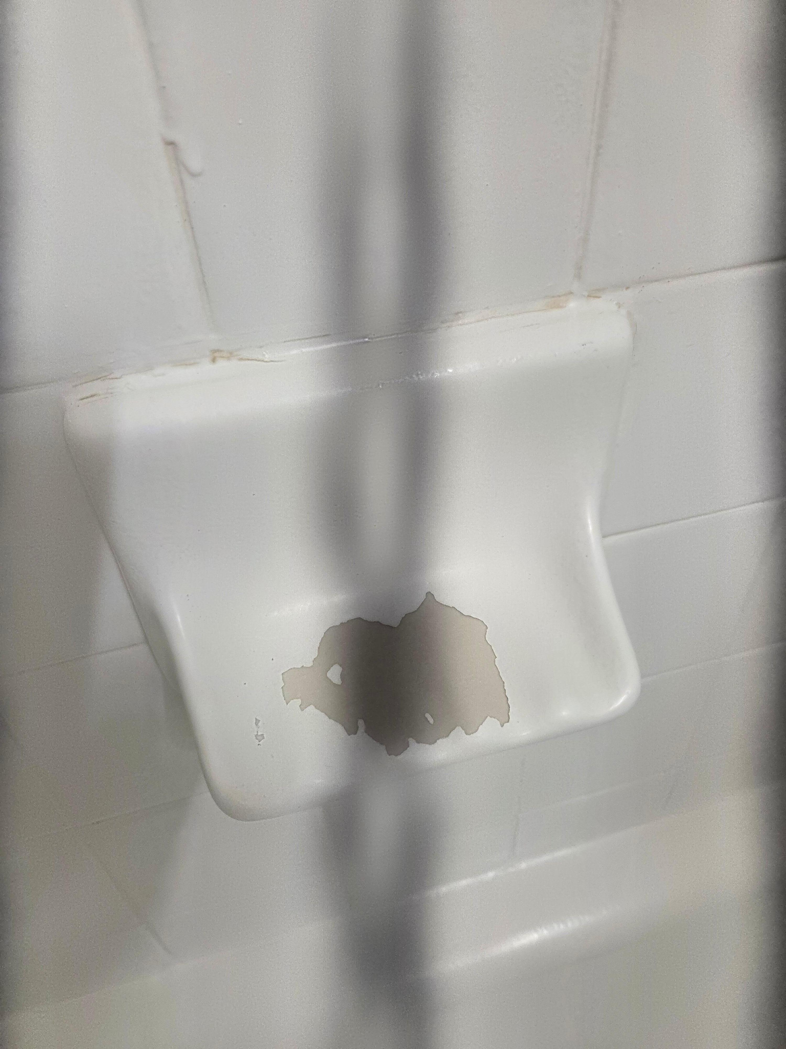 Soap dish peeling up.