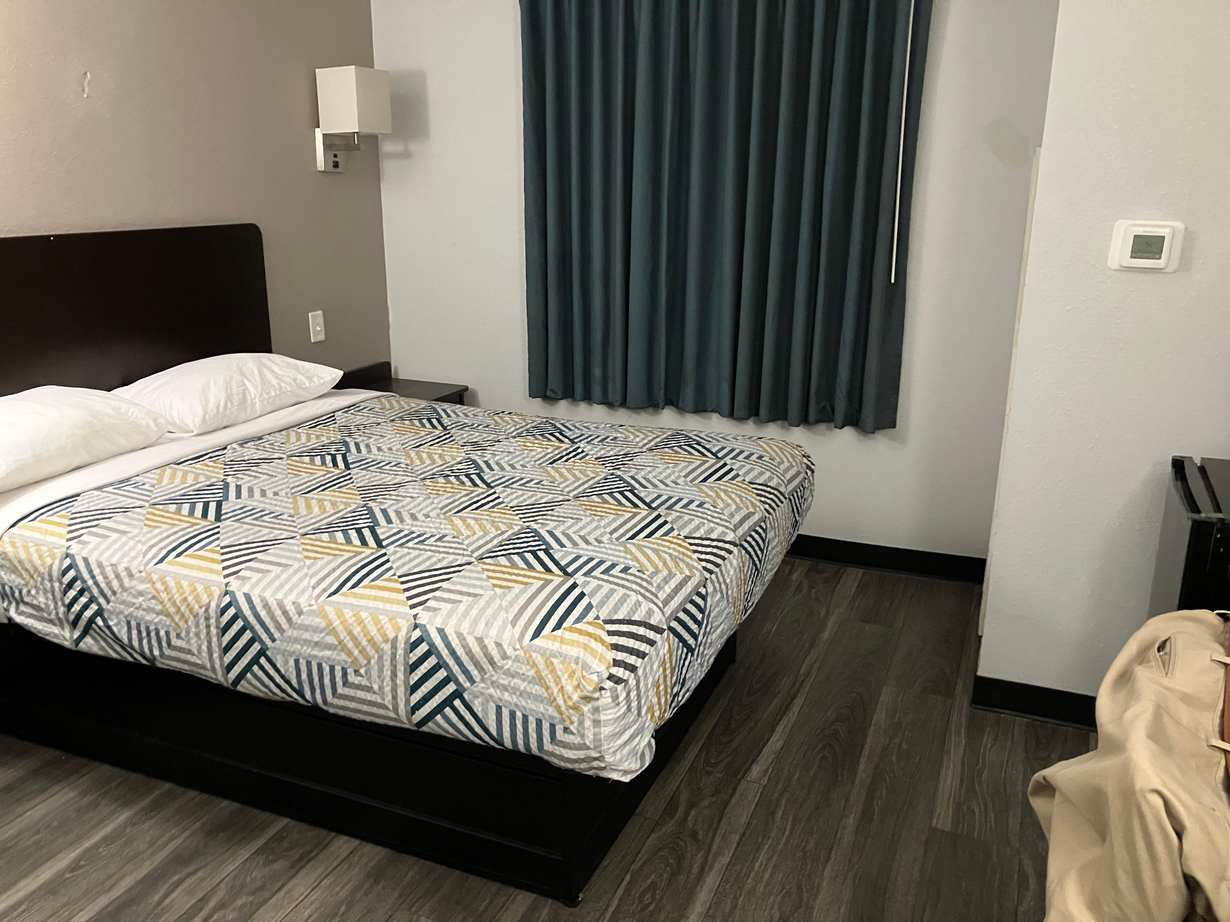 Clean and comfortable with a refrigerator and microwave.