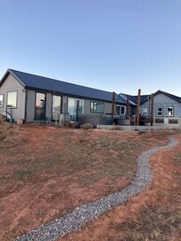 Path from the deck to the house