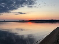 Sunrise looking east over the West Bay Beach