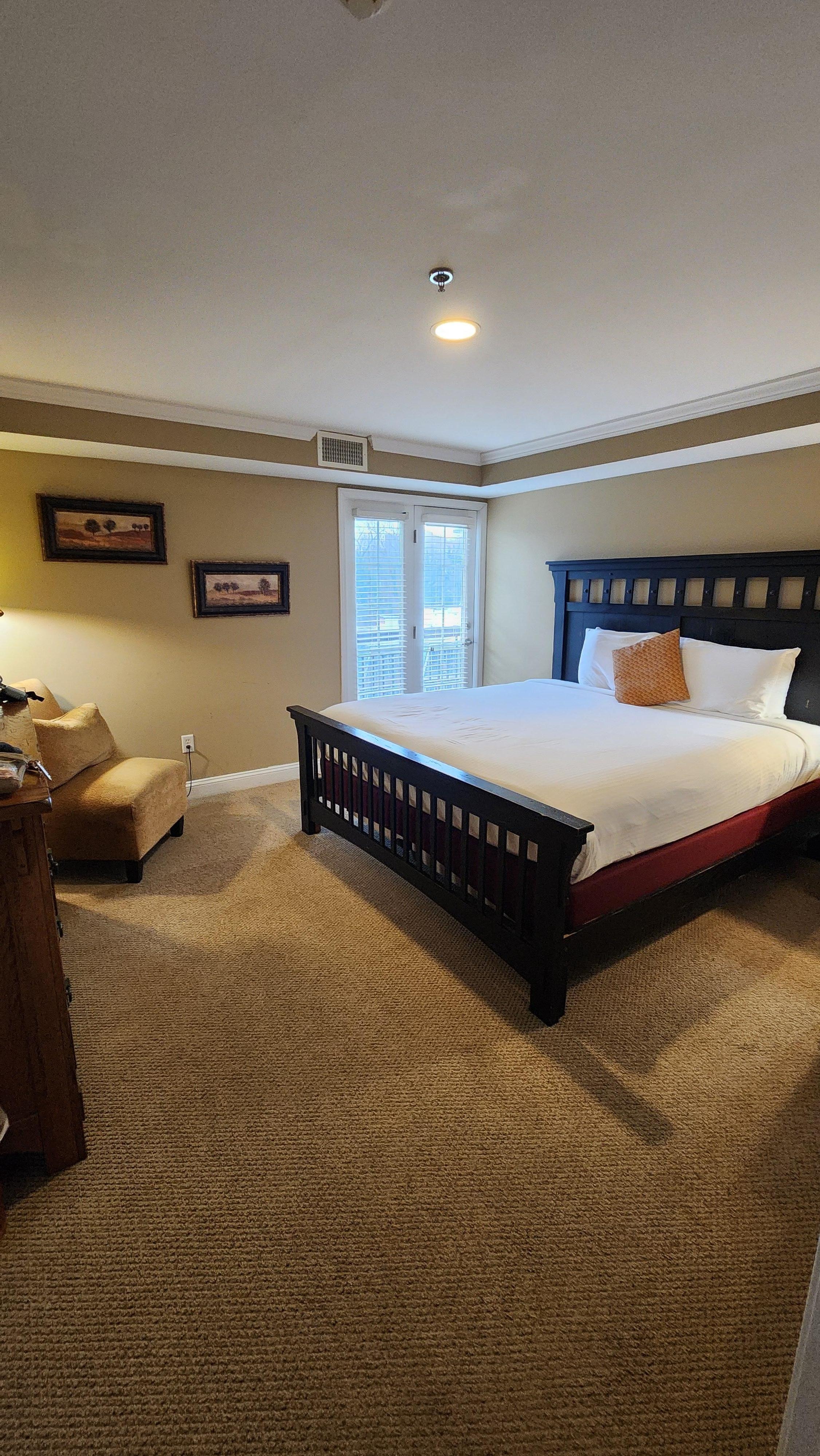 Comfy bed. French doors