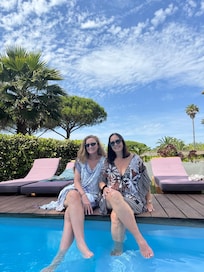Loved The Soft Wood Around Pool For Sitting!!